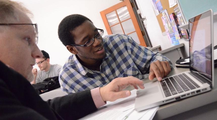 Student working with a counselor